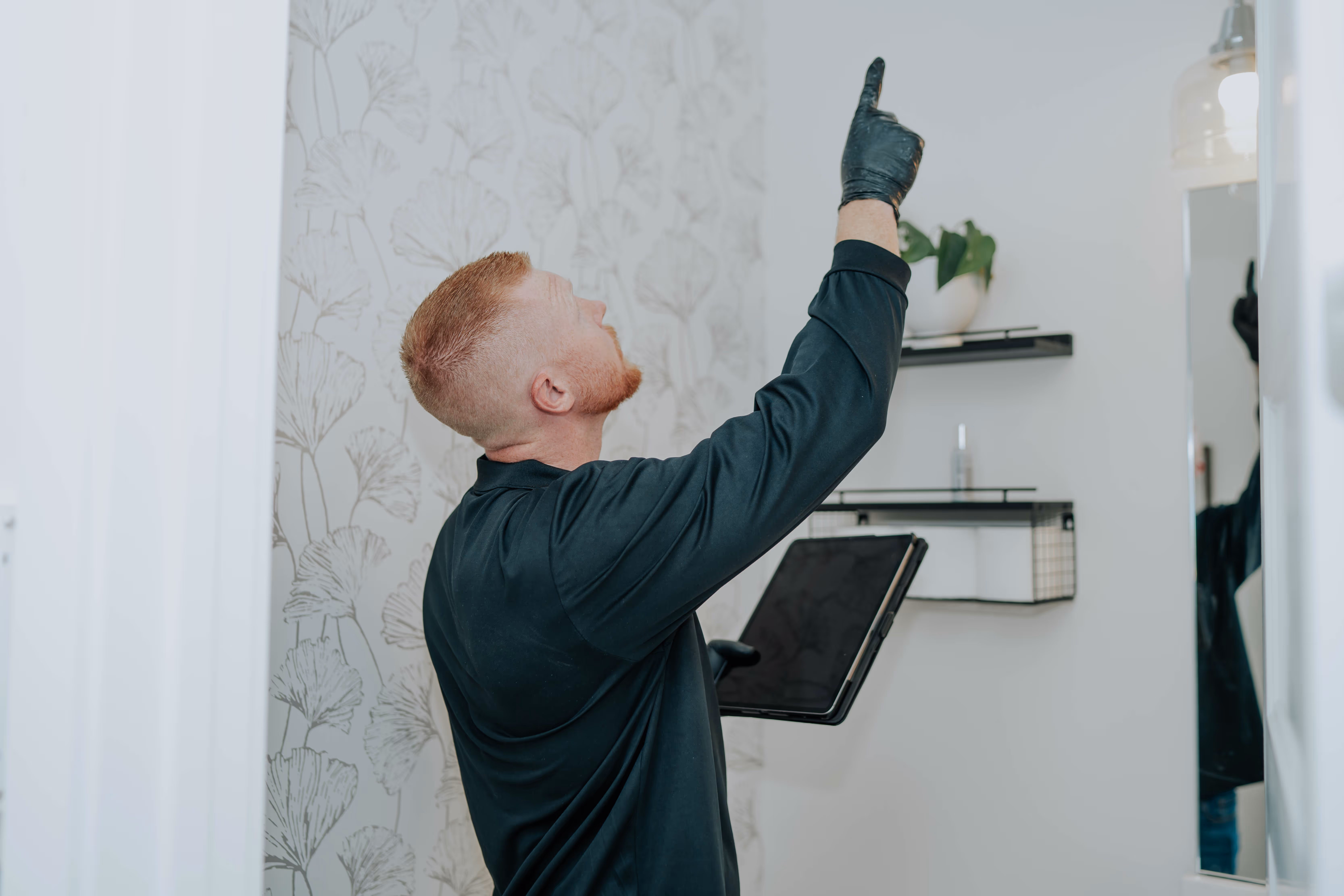 Pure Maintenance of Utah specialist inspecting a property